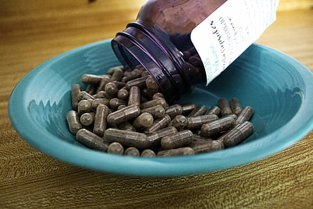 capsules on blue saucer thumbnail