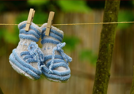 pair of white-and-blue shoes thumbnail