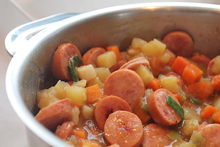 sausage and vegetables soup in bowl thumbnail