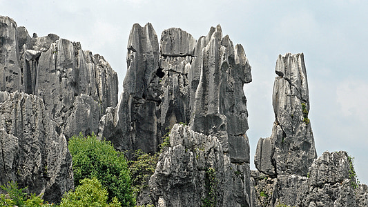 gray rock formation under gray skies thumbnail