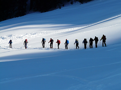 several people walking on snow mountain thumbnail
