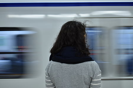 person standing near train thumbnail