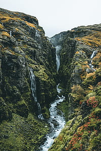 waterfalls surrounded with trees thumbnail