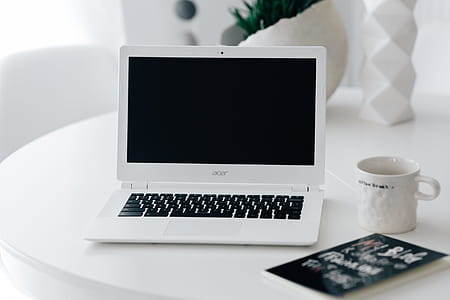 Workplace with laptop on table at home thumbnail