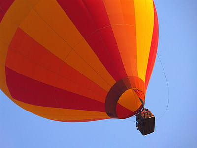 low angle photography of red hot air balloon thumbnail