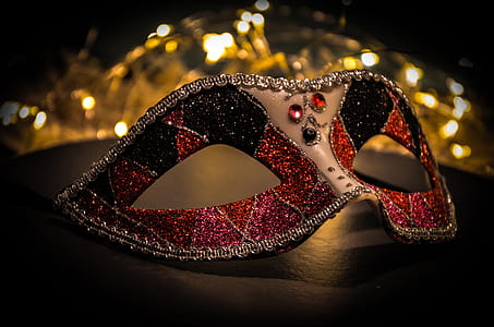 selective focus photography of masquerade mask thumbnail