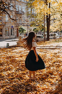 woman standing on flowers fields thumbnail