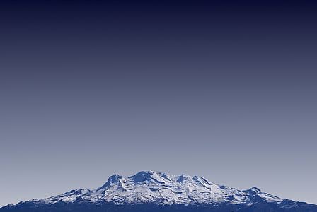 snow covered mountain taken during daytime thumbnail