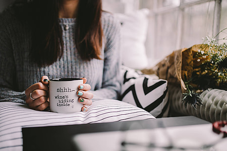 Girl drinking wine in her mug thumbnail