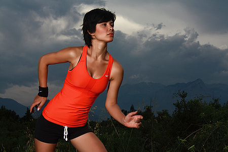 woman wearing orange tank top outdoor thumbnail