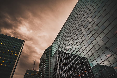 low angle photography of glass building thumbnail