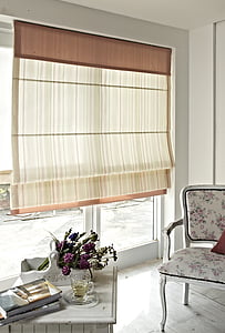 room with brown and white window curtain brown wooden chair thumbnail