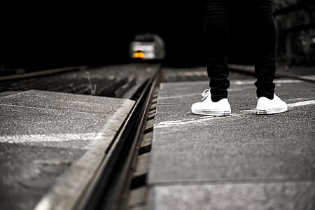 person standing on road side thumbnail