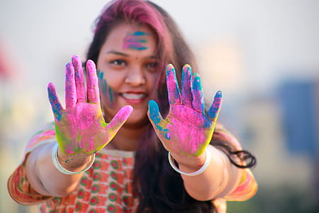 Woman Showing Her Hands With Assorted Color Paints thumbnail