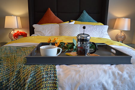 black french press and white mug on black tray thumbnail