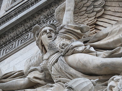 angel statue mounted on wall thumbnail