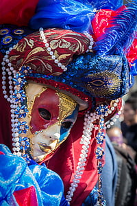 person wearing blue and white mask at daytime thumbnail