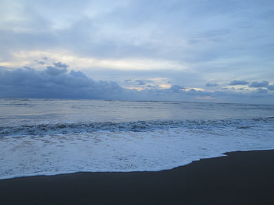 sea waves under cloudy sky thumbnail