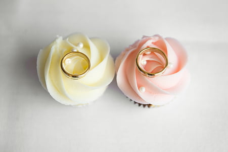 two gold-colored rings on flower decors thumbnail