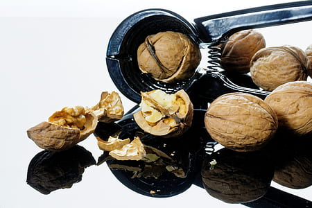 walnuts cracked using nutcracker thumbnail