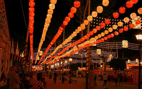 lighted red and orange paper lanterns thumbnail