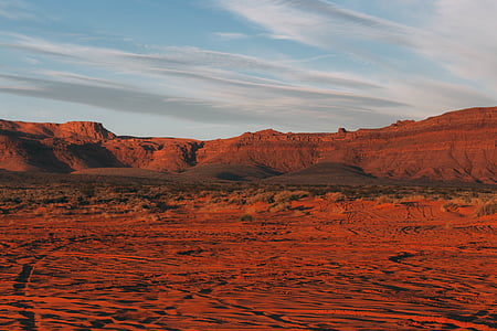 sand field near mountains thumbnail