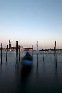 landscape photo of boat on body of water thumbnail