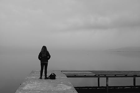 woman standing on dock thumbnail