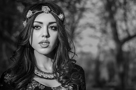 grayscale photography of a woman with floral head band thumbnail