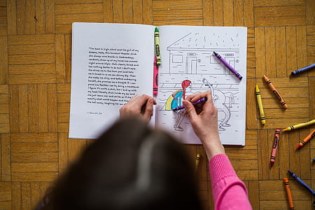 girl coloring a book thumbnail