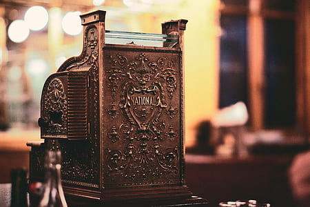 selective focus photo of brown floral embossed case thumbnail