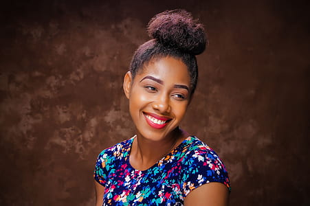 woman wearing blue floral top thumbnail