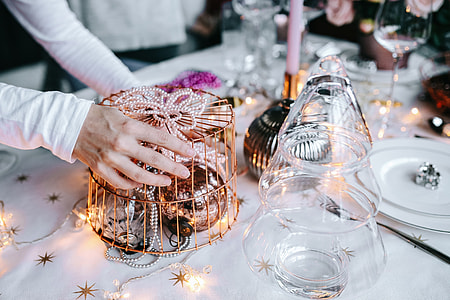 Hands Decorating Christmas Table thumbnail
