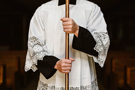 person holding brass pole thumbnail