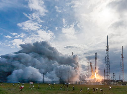 transmission posts under white clouds thumbnail