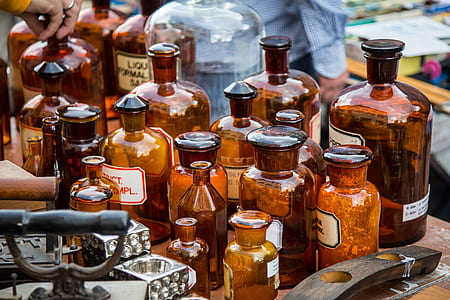 closeup photo of amber glass bottles display thumbnail