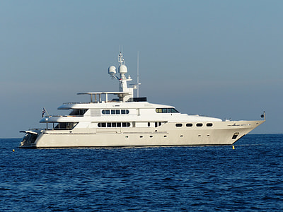 white yacht under blue sky during daytime thumbnail