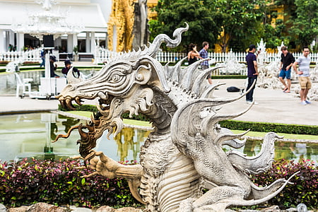 selective focus photography of dragon statue thumbnail