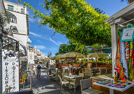 patio sets under green leafed trees thumbnail