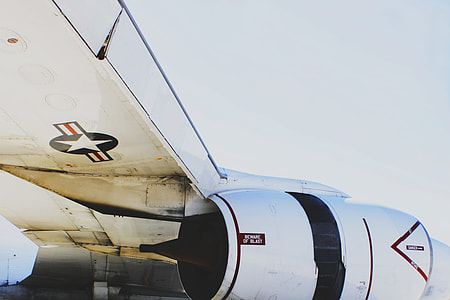 white jet plane during daytime thumbnail