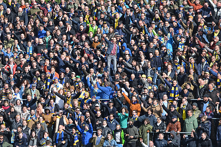 crowd cheering during daytime thumbnail