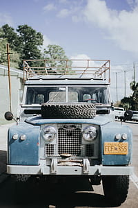 gray vehicle on road thumbnail