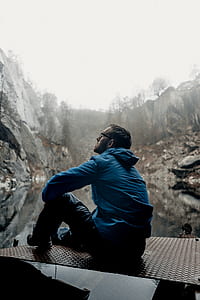 person wearing blue jacket thumbnail