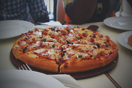 baked pizza on table thumbnail
