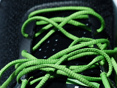 selective focus photo of green shoe lace thumbnail