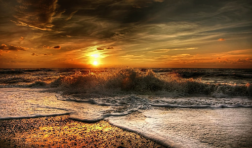 body of water during sunset thumbnail