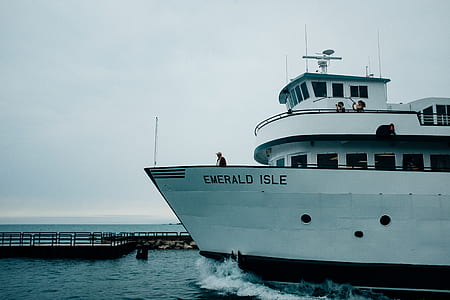 man standing on Emerald Isle ship thumbnail