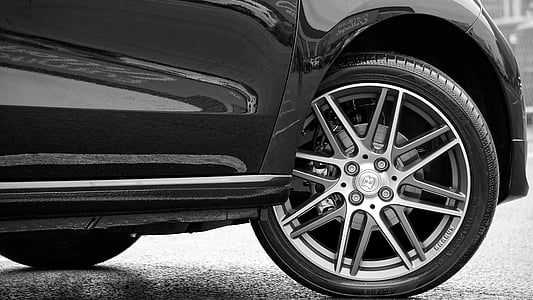closeup photography of black car with gray multispoke vehicle wheel and tire thumbnail