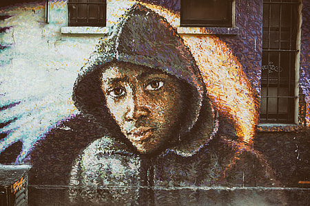 Street Art depicting a man wearing a hoodie top thumbnail