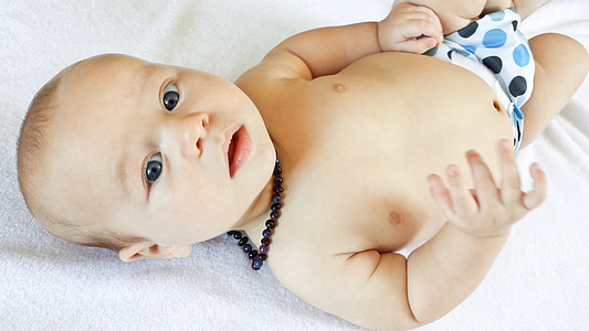 baby wearing white and blue underweat thumbnail